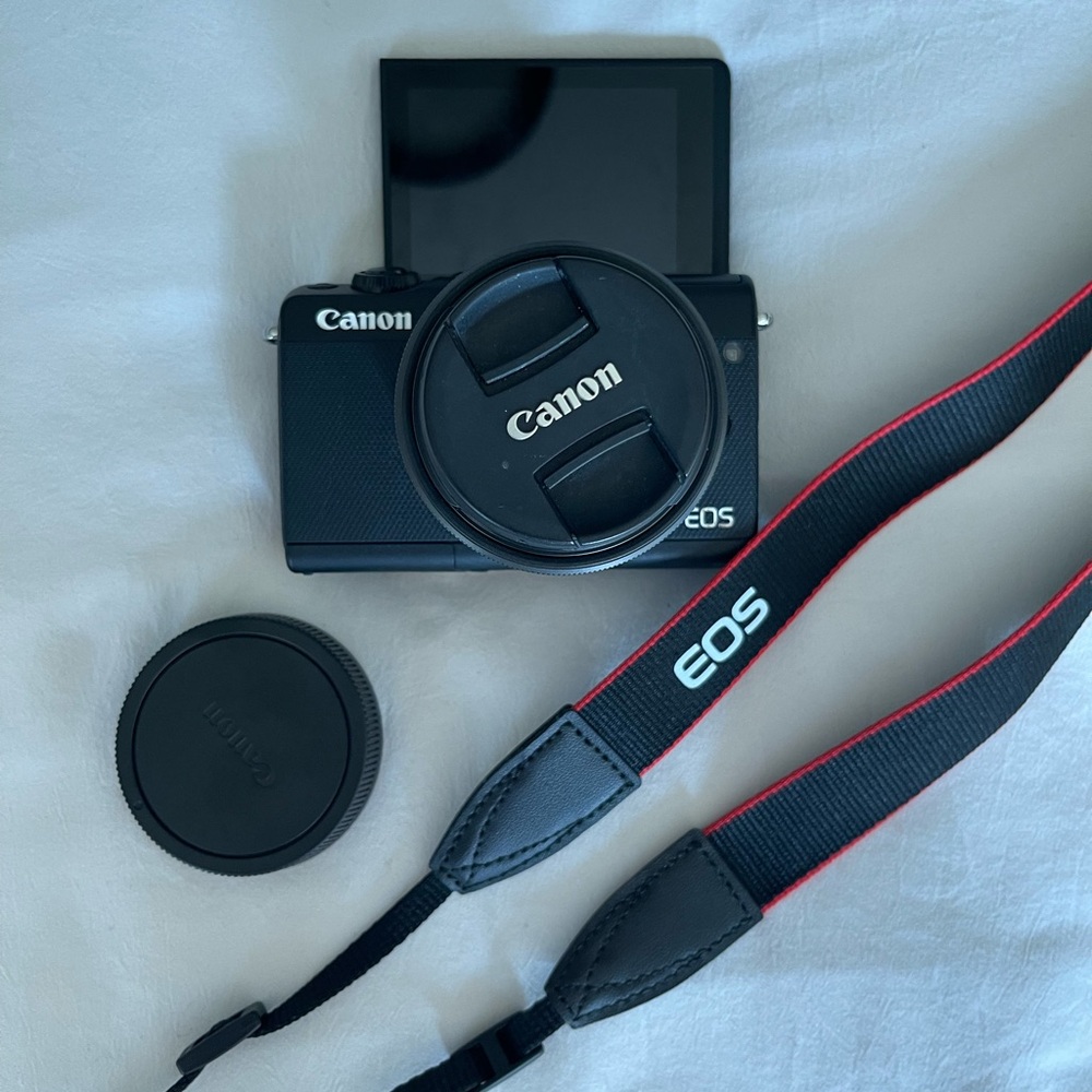 Canon Black Mirrorless Digital Camera with EOS Strap